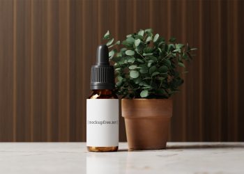 Amber Glass Dropper Bottle with Eucalyptus Plant Free Mockup