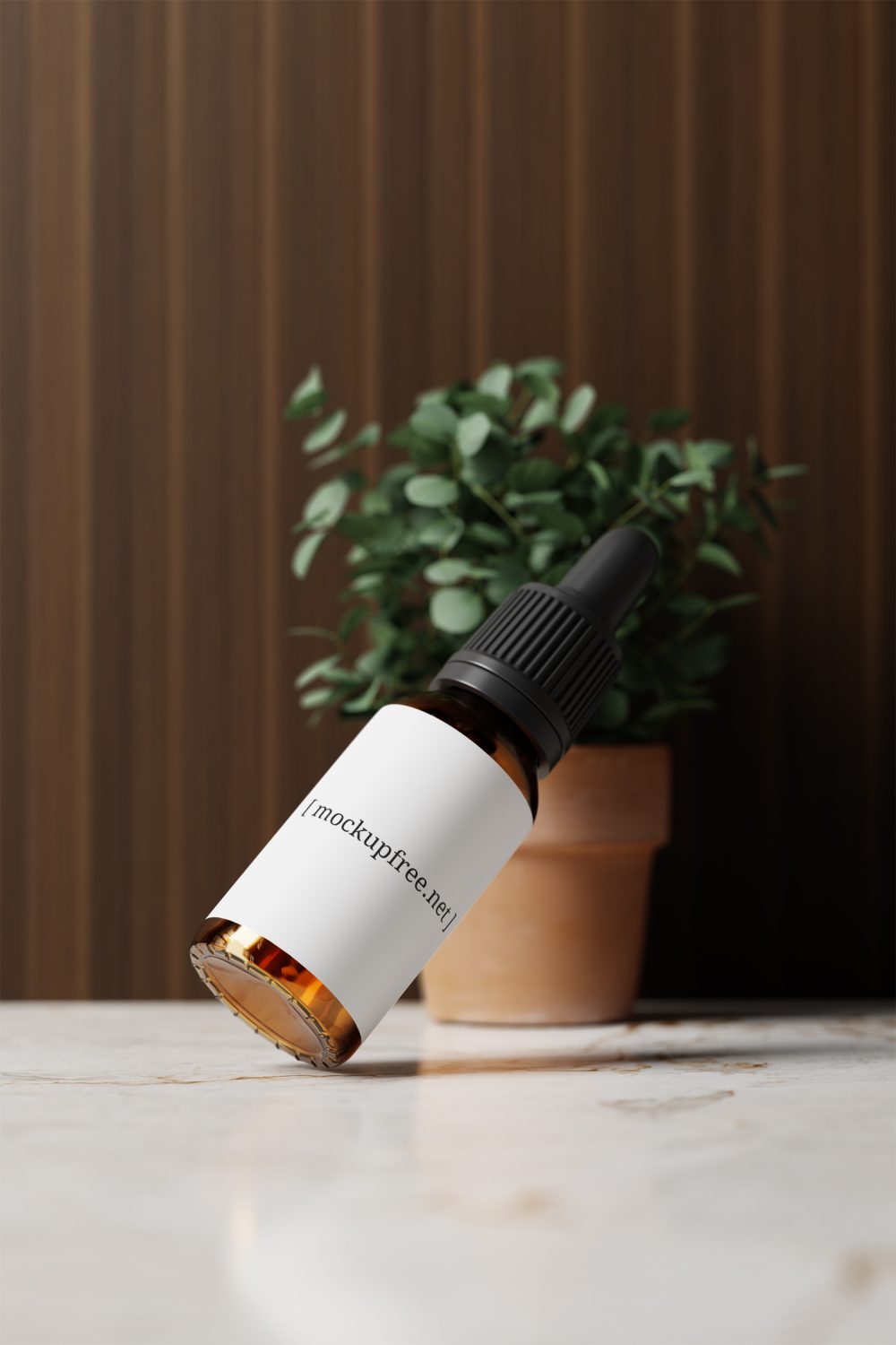 Amber Glass Dropper Bottle with Eucalyptus Plant Free Mockup