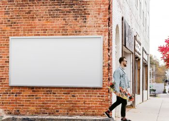 City Billboard on Brick Wall Free Mockup