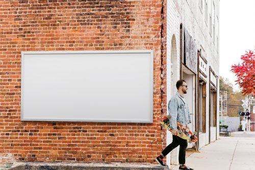 City Billboard on Brick Wall Free Mockup