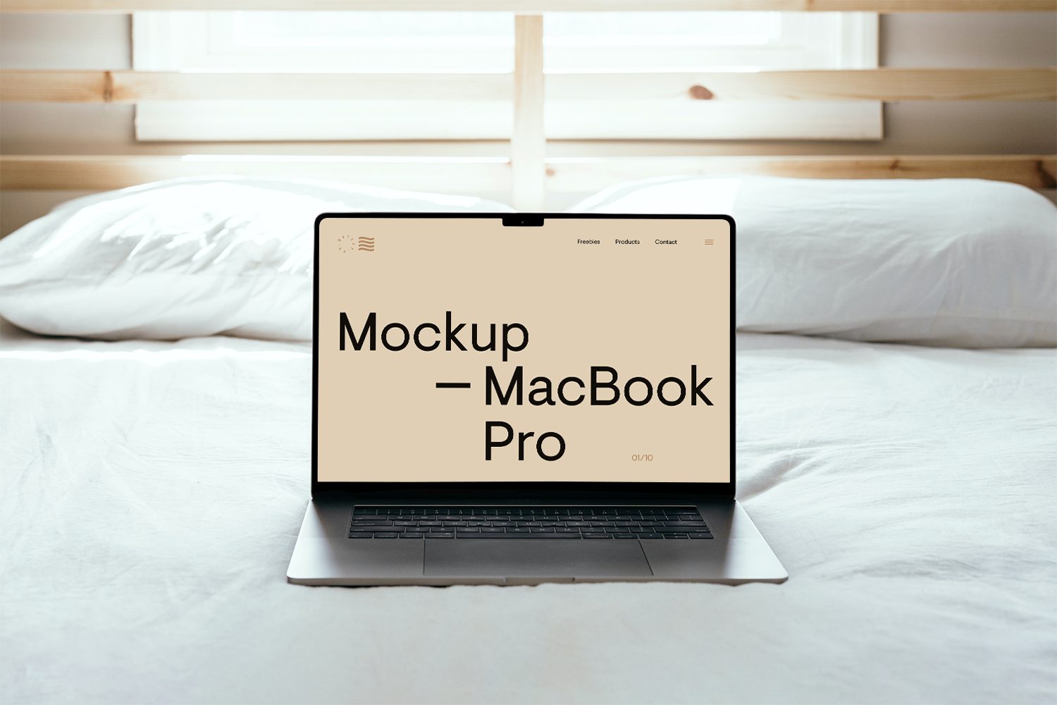 MacBook Pro on Bed Free Mockup