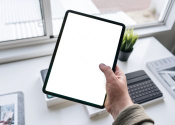 Tablet in Hand Free Mockup