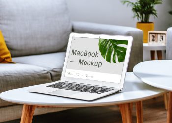 MacBook on Table Free Mockup