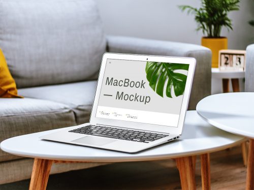 MacBook on Table Free Mockup