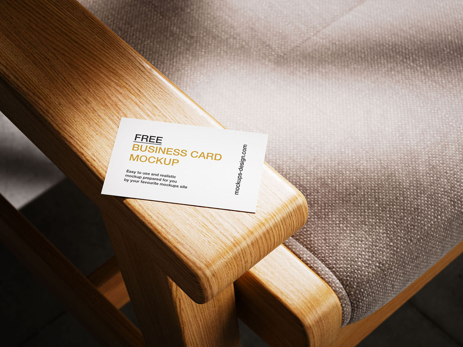 Business Card Lying on Armchair Free Mockup