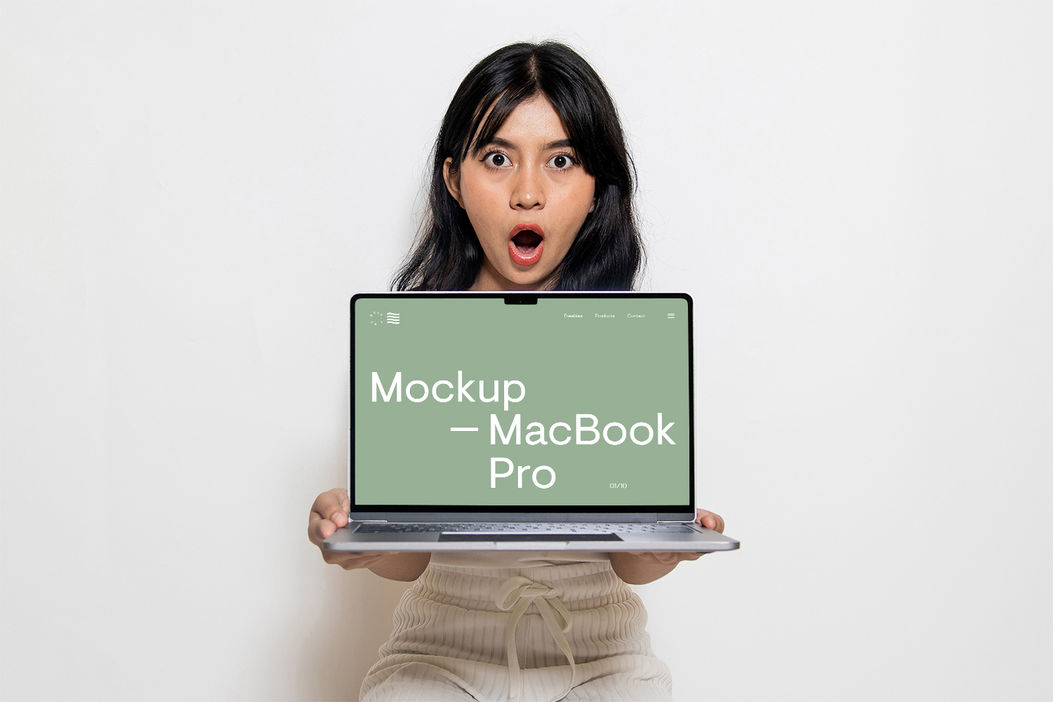 MacBook Pro Holding by Women Free Mockup