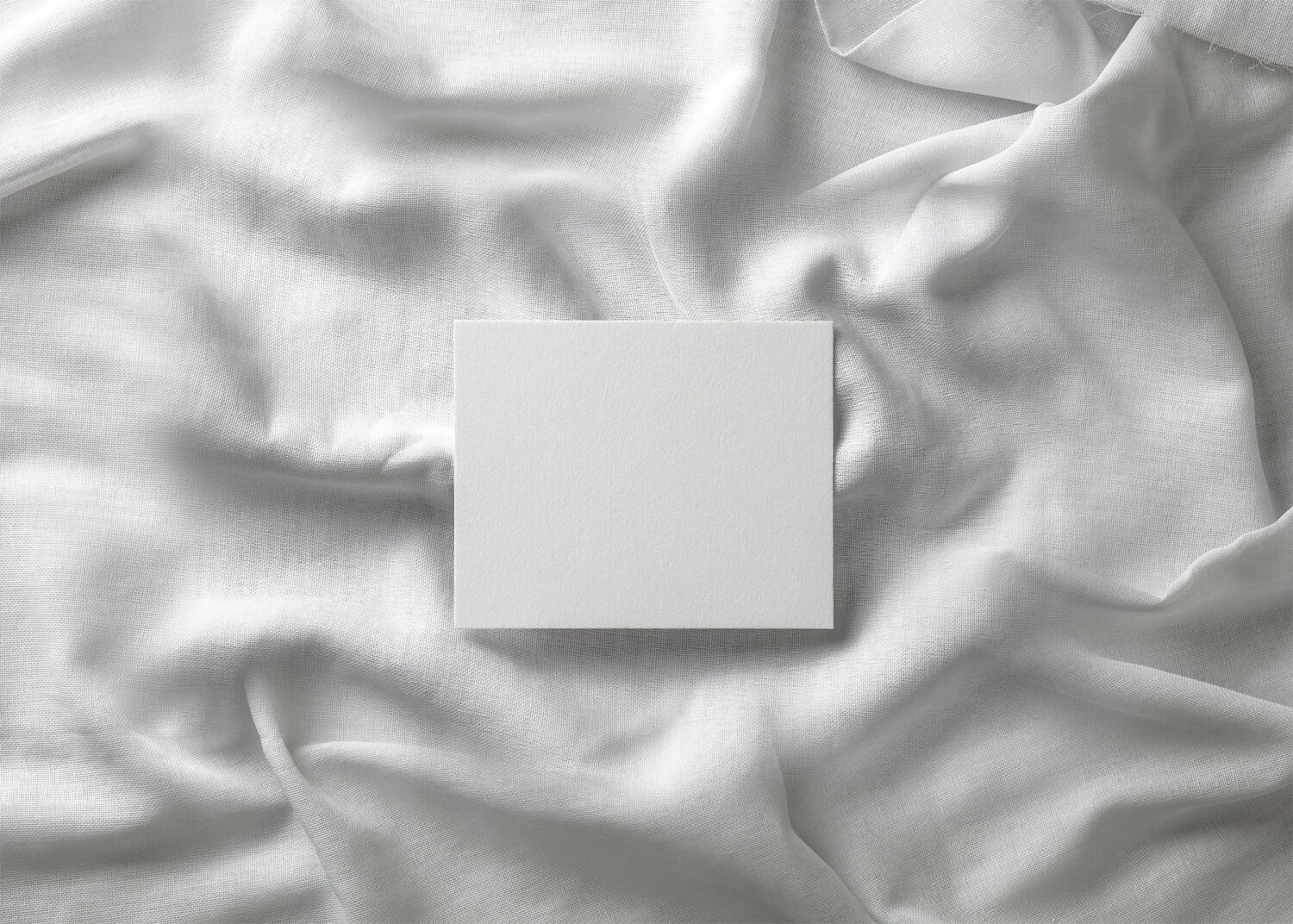 Top View Invitation Card Mockup on Fabric