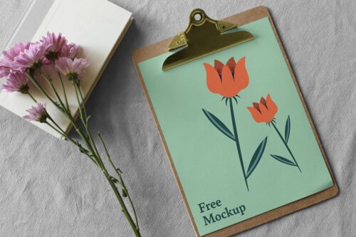 Free Paper Clipboard Mockup Scene with Flowers