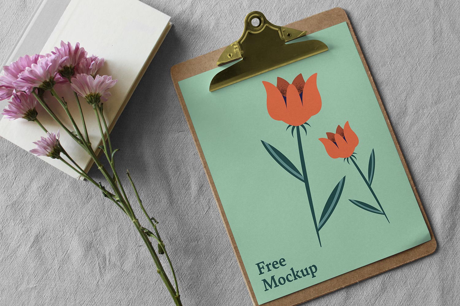 Free Paper Clipboard Mockup Scene with Flowers